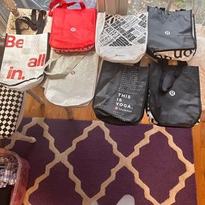 Lot of 7 lululemon small bags.